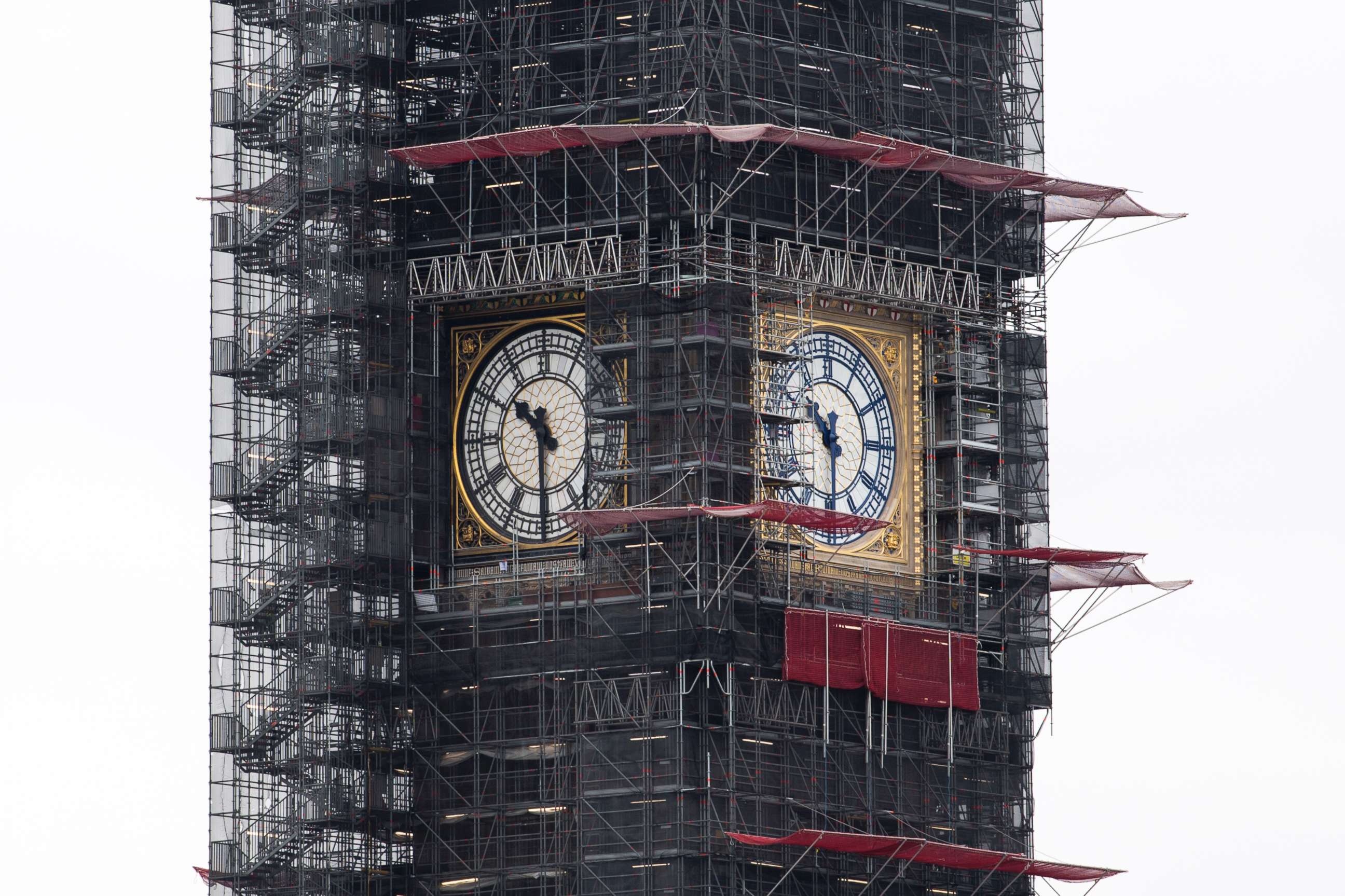 PHOTO: A part of the clock tower has been revealed for the first time since restoration work began in 2017. And it shows a mostly blue face (replacing black). 