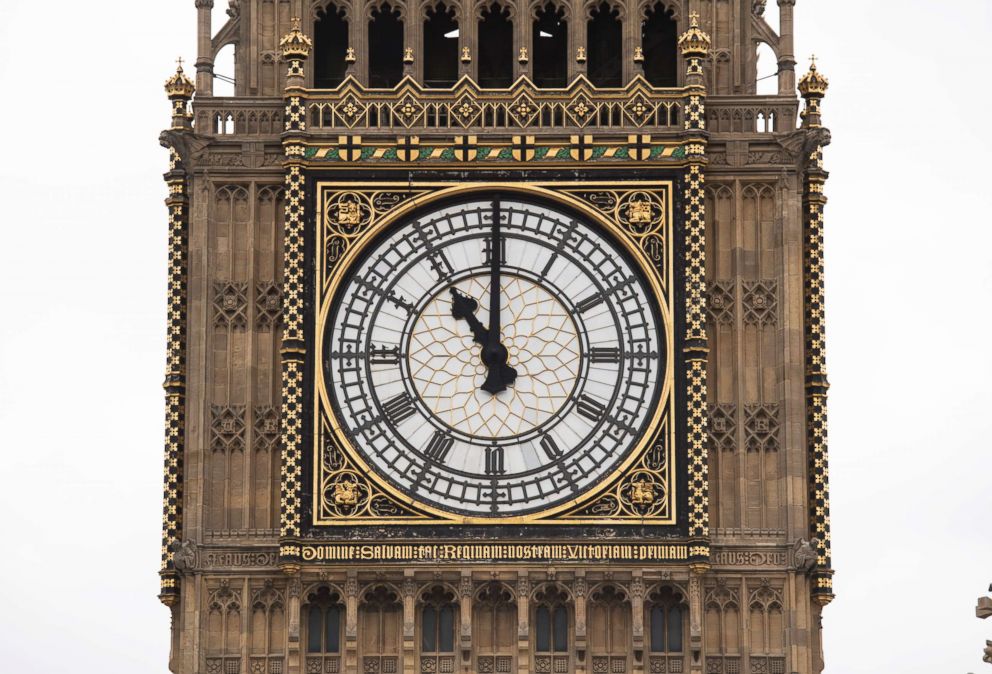 PHOTO: A part of the clock tower has been revealed for the first time since restoration work began in 2017. And it shows a mostly blue face (replacing black). 