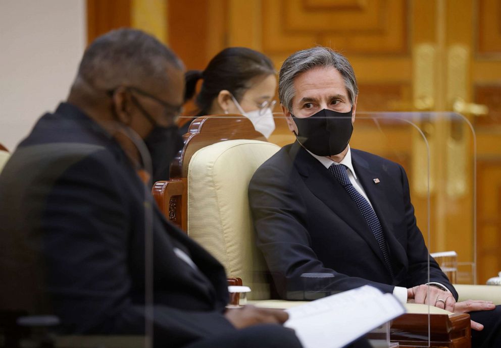 PHOTO: U.S. Defense Secretary Lloyd Austin, left, speaks as U.S. Secretary of State Antony Blinken looks on during their meeting with South Korean President Moon Jae-in at the Presidential Blue House in Seoul, South Korea, March 18, 2021. 