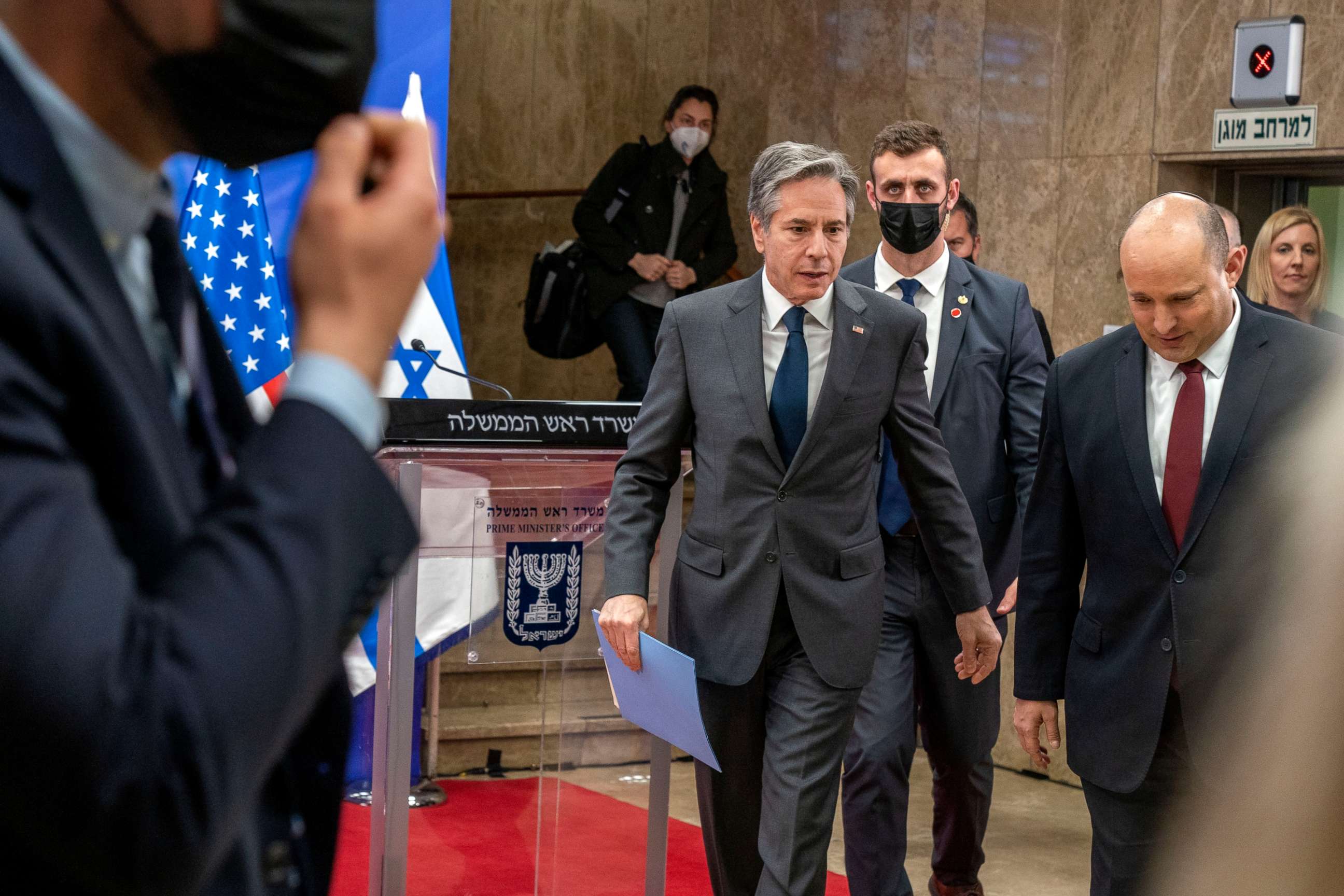 PHOTO: U.S. Secretary of State Antony Blinken, left, walks with Israel's Prime Minister Naftali Bennett, right, at the Prime Minister's Office, on March 27, 2022, in Jerusalem.