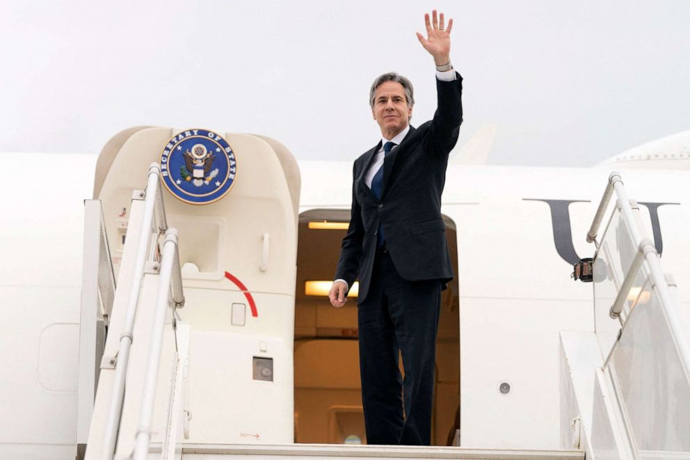 PHOTO: Secretary of State Antony Blinken waves as he boards a plane to depart from the Algerian capital Algiers, on March 30, 2022.