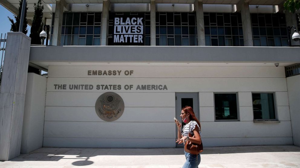 PHOTO: A Black Lives Matter banner, marking the one-year anniversary of the killing of George Floyd by a Minneapolis police officer, hangs from the U.S. Embassy in Athens, May 25, 2021.