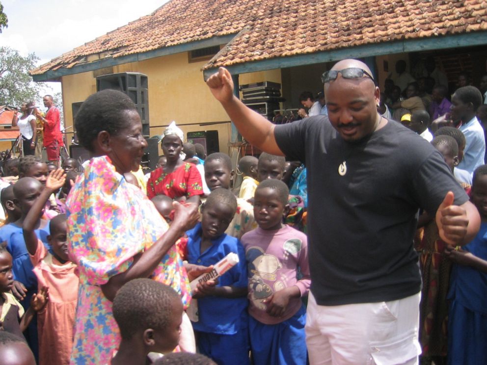 PHOTO: Darrell Blocker dancing during a 2004 visit to Soroti, Uganda, with his band, the Kampala Jazz All-Stars.