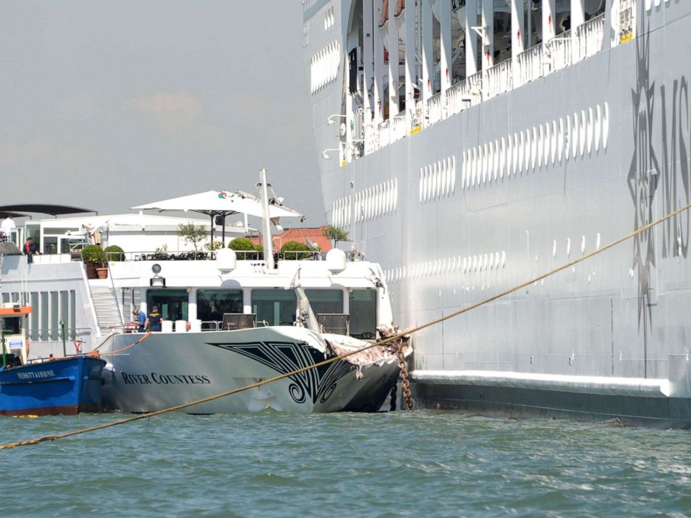 PHOTO: The cruise ship MSC Opera (R) is seen after the collision with a tourist boat, in Venice, Italy, June 2, 2019. 