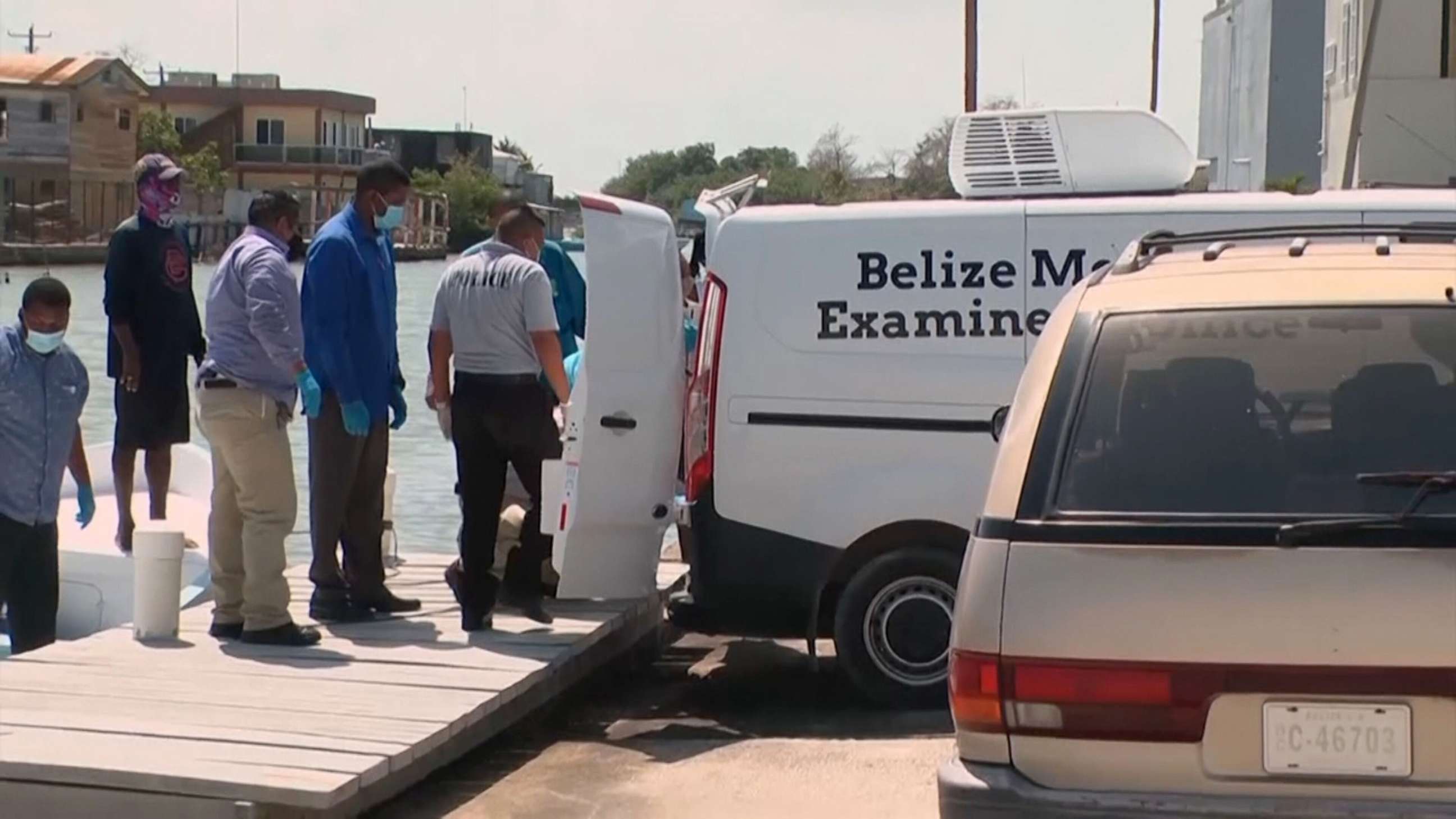 PHOTO: The body of police Superintendent Henry Jemmott is loaded into a vehicle in Belize, May 28, 2021.