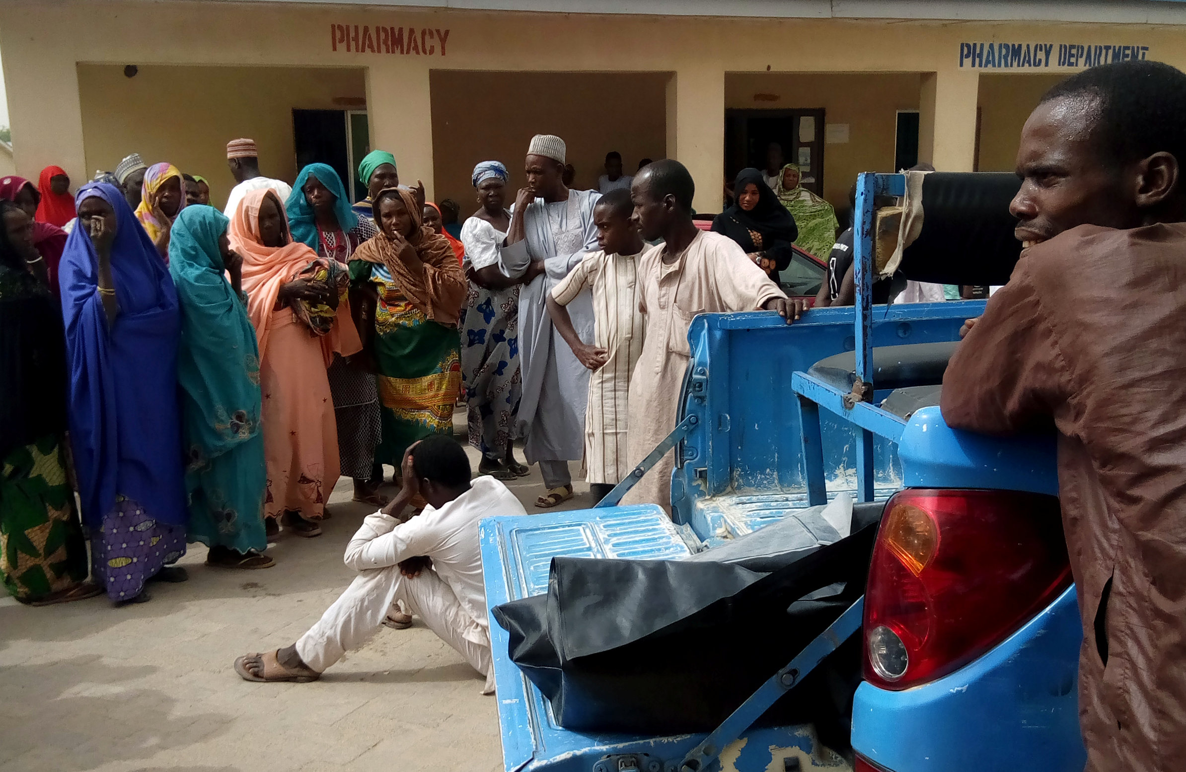 PHOTO: A man reacts as dead bodies are brought to a hospital after a suspected Boko Haram attack on the edge of Maiduguri's inner city, Nigeria April 2, 2018.