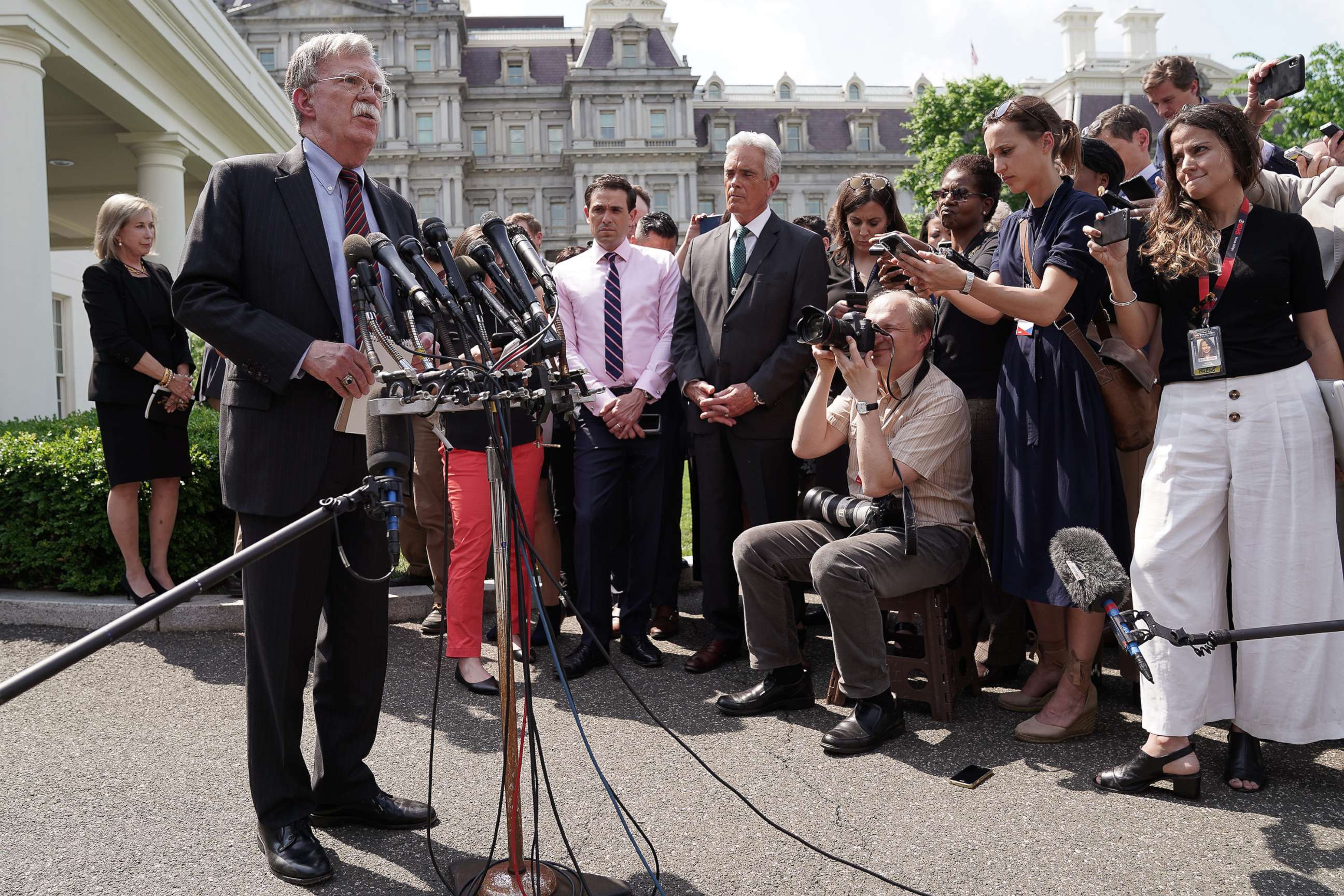 PHOTO: White House National Security Advisor John Bolton talks to reporters outside of the White House, April 30, 2019, about the security and political turmoil in Venezuela.