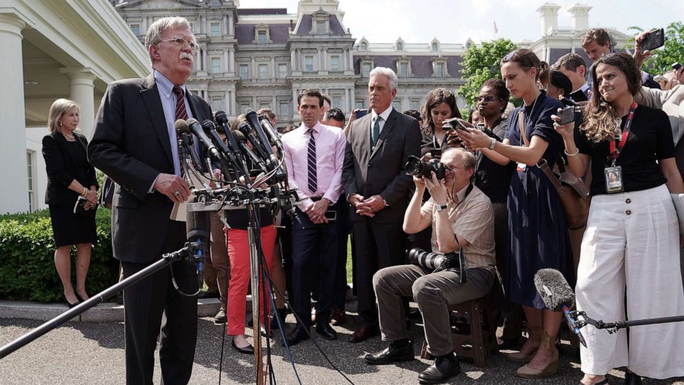 PHOTO: White House National Security Advisor John Bolton talks to reporters outside of the White House, April 30, 2019, about the security and political turmoil in Venezuela.