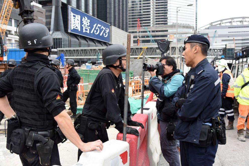 PHOTO: Police staff blockade the site where a 1,000 pound World War II bomb was unearthed in Wanchai District, Jan. 27, 2018, in Hong Kong. 