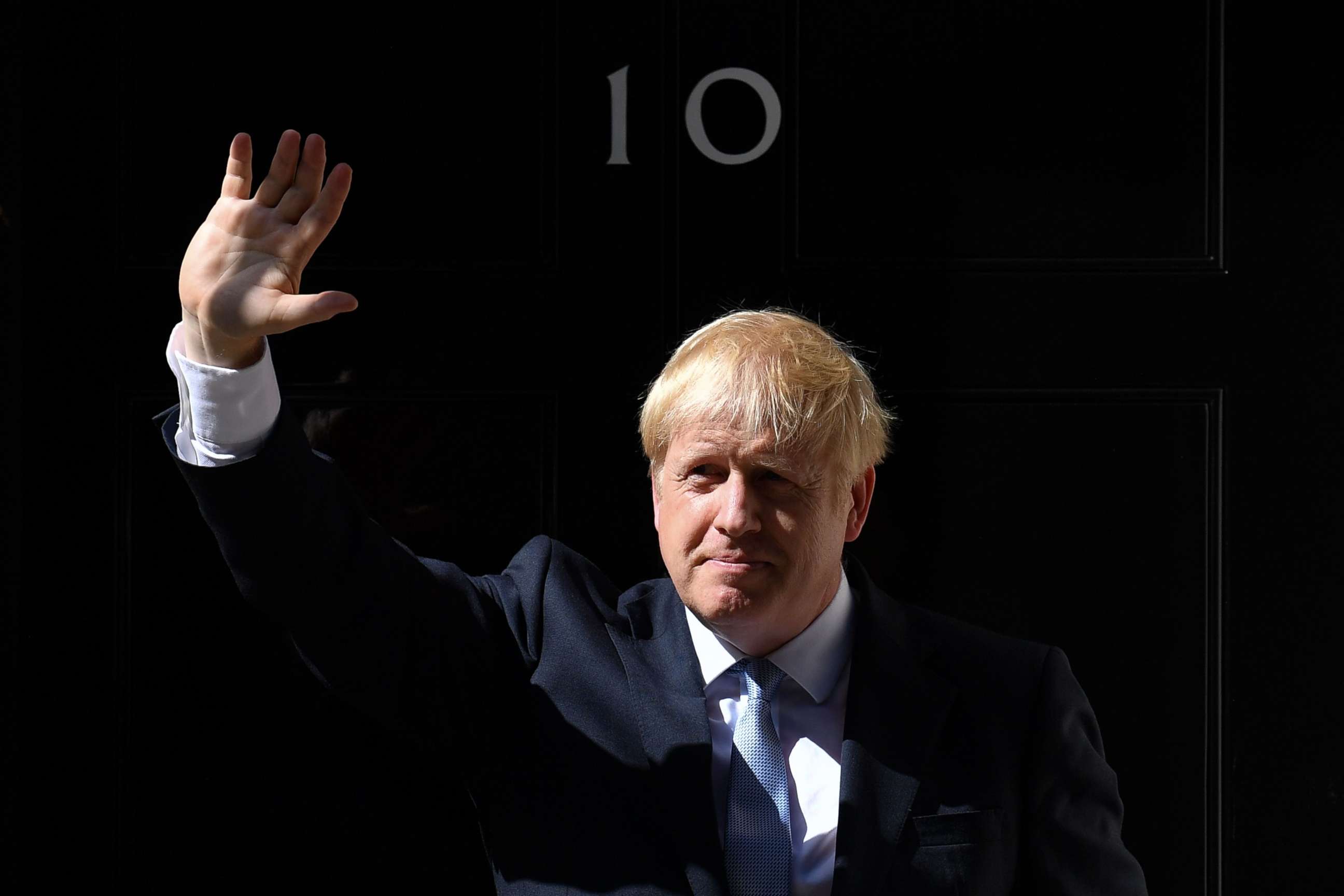 PHOTO: Britain's new Prime Minister Boris Johnson gestures after giving a speech outside 10 Downing Street in London on July 24, 2019 on the day he was formally appointed British prime minister.