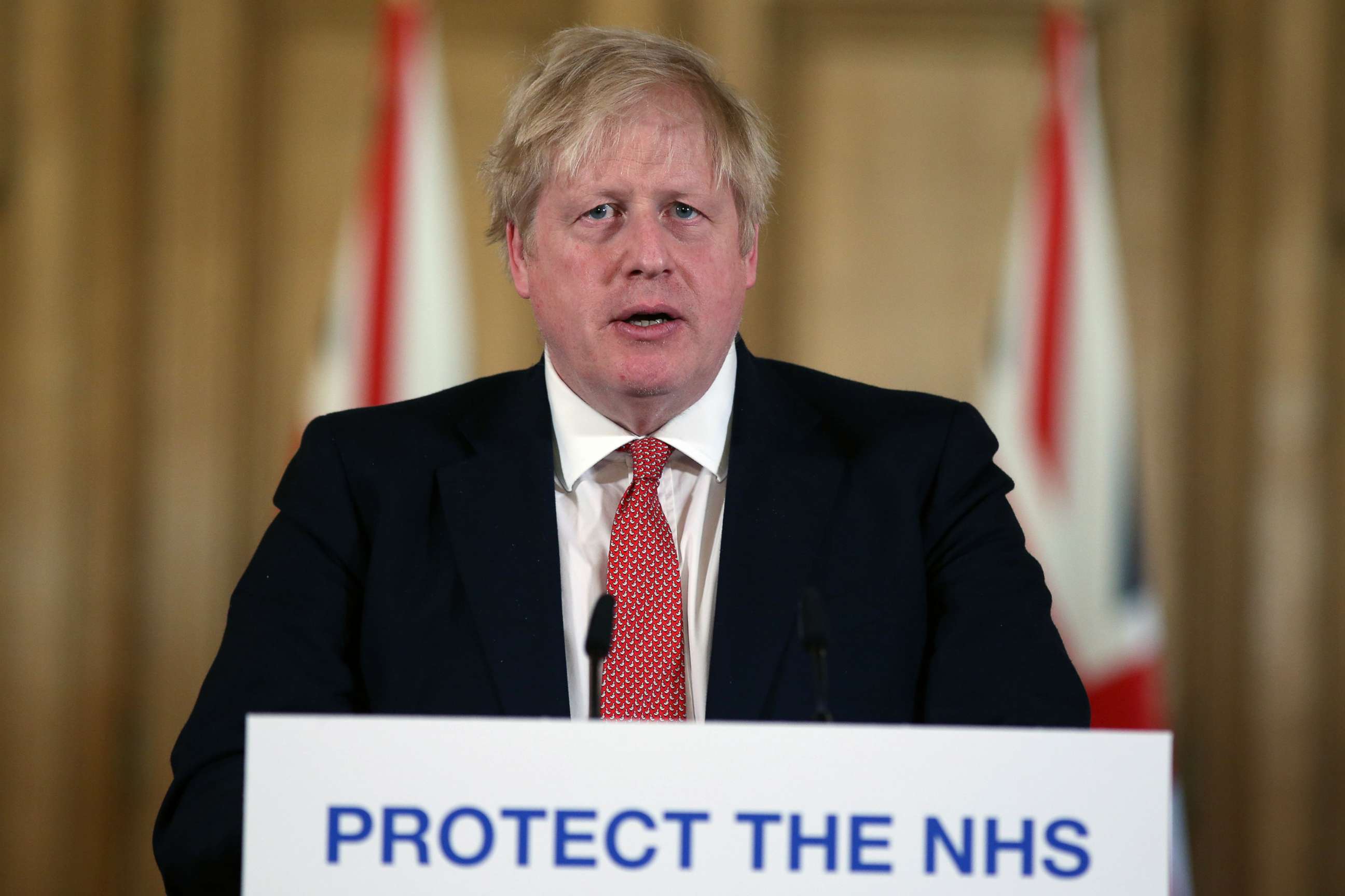 PHOTO: British Prime Minister Boris Johnson gives his daily COVID 19 press briefing at Downing Street on March 22, 2020 in London.