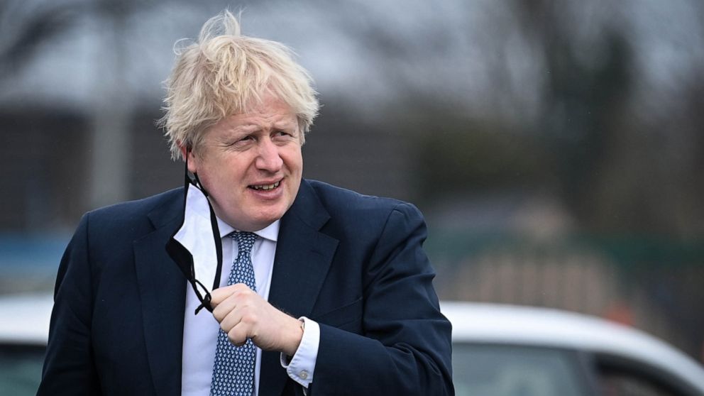 PHOTO: British Prime Minister Boris Johnson reacts as he arrives at the Brussels' military airport, following his meeting with NATO Secretary General and prior to travelling to Warsaw, Feb. 10, 2022, in Brussels.