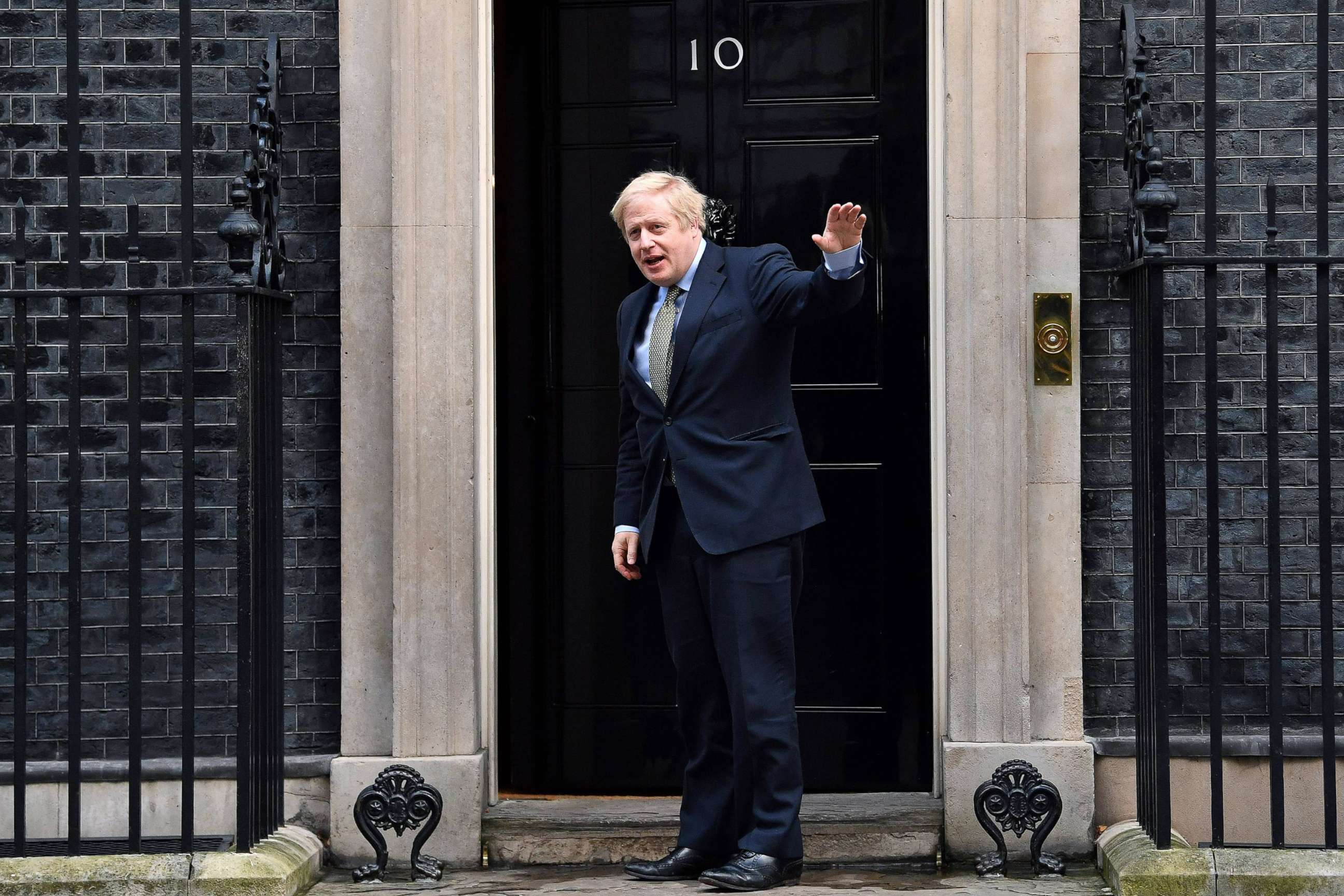 PHOTO: Britain's Prime Minister and Conservative Party leader Boris Johnson arrives at 10 Downing Street in London on Dec. 13, 2019, following an audience with Queen Elizabeth II, where she invited him to become Prime Minister and form a new government.