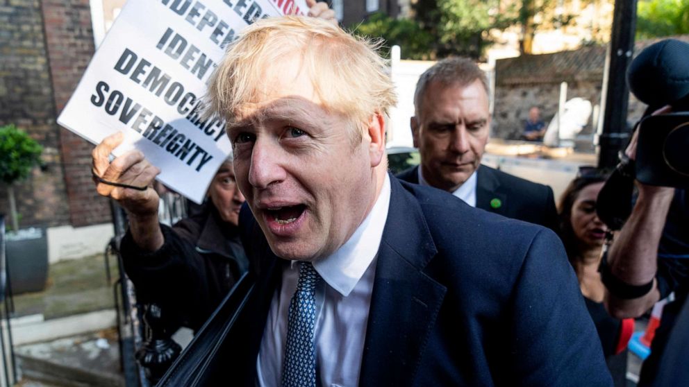 PHOTO: Conservative MP and leadership contender Boris Johnson arrives at his campaign headquarters in central London on July 23, 2019.