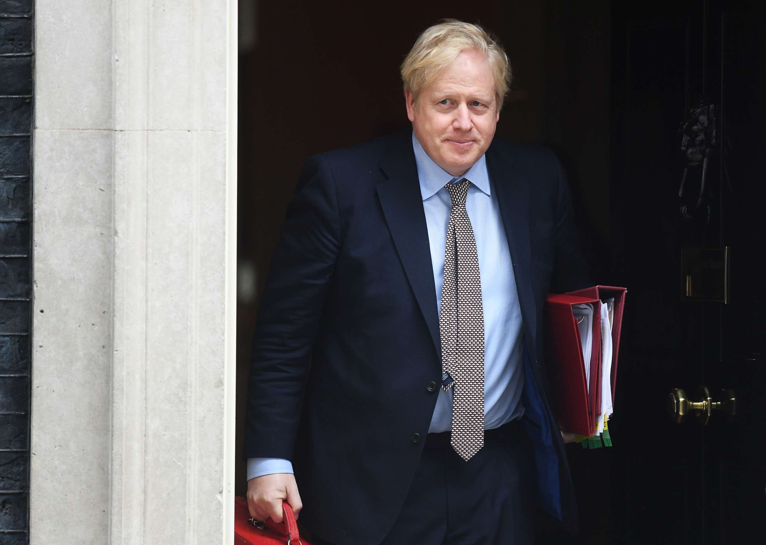 PHOTO: Prime Minister Boris Johnson leaves Downing Street to attend Prime Minsters Questions at the Houses of Parliament on March 4, 2020 in London.