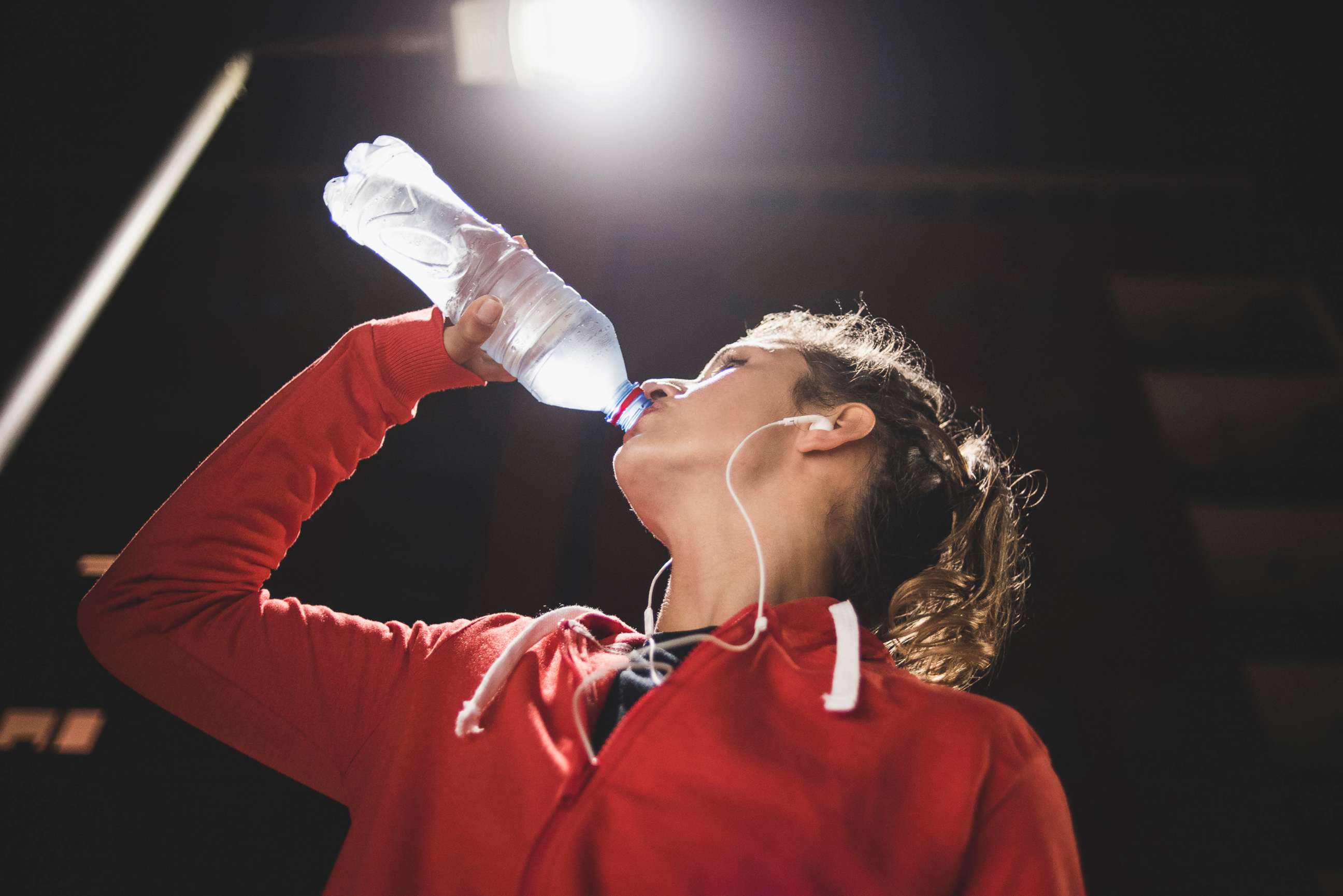 PHOTO: In this undated file photo, a woman drinks bottle water after a workout.