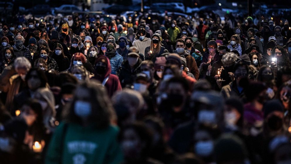 PHOTO: Mourners attend a vigil on March 25, 20221 for the victims at the King Soopers grocery store shooting in Boulder, Colo.