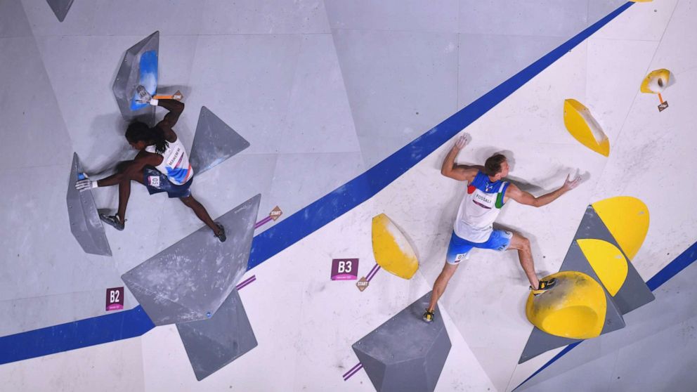 PHOTO: Mickael Mawem of France and Ludovico Fossali of Italy are seen in action during the bouldering qualification on Aug. 3, 2021, in Tokyo, Japan.