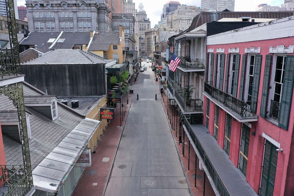 PHOTO: The normally bustling tourist mecca of Bourbon Street lies deserted in the early afternoon during shelter in place orders to slow the spread of coronavirus disease (COVID-19) in New Orleans, Louisiana, March 27, 2020. 