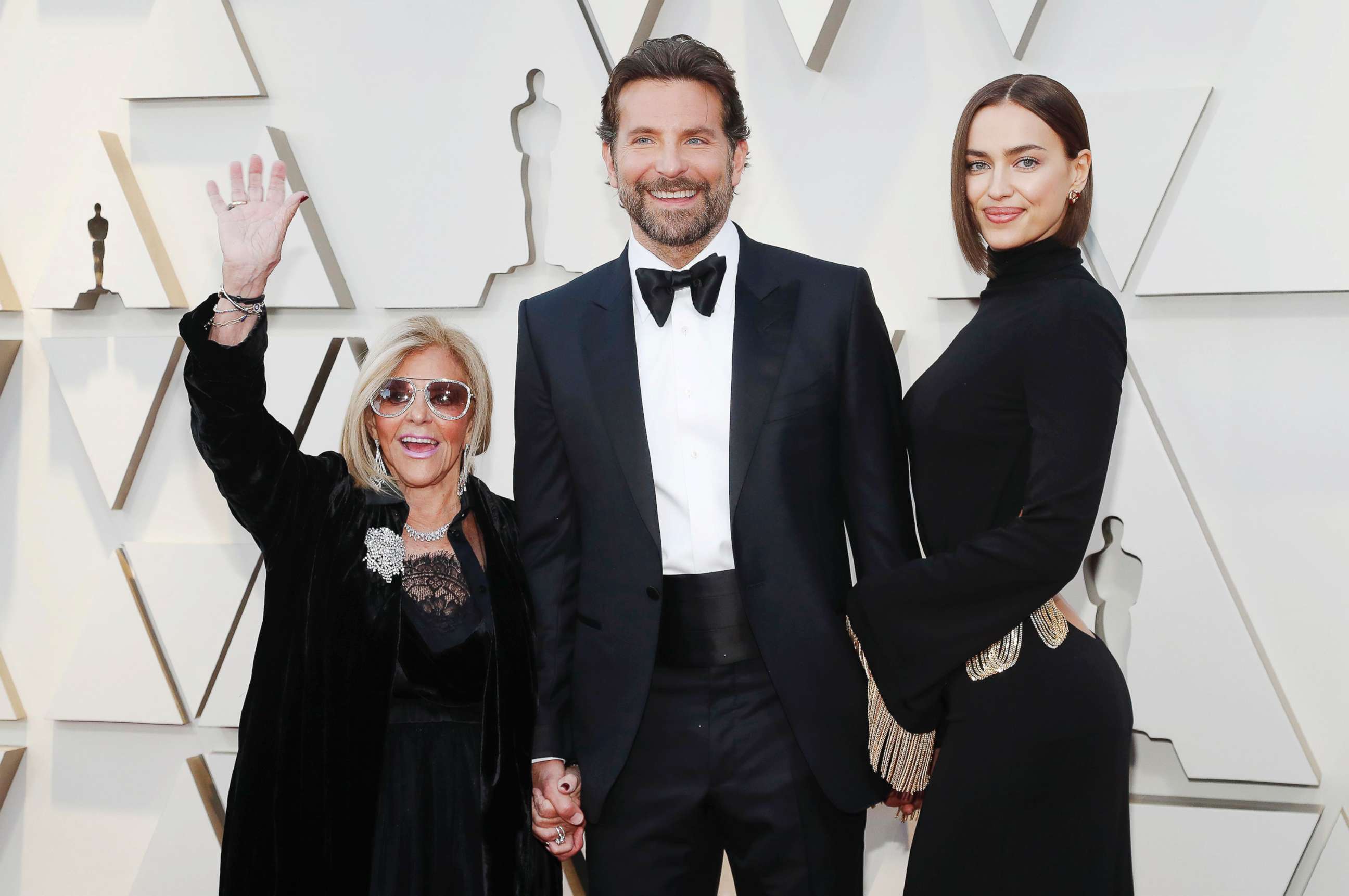 PHOTO: Bradley Cooper arrives with mother Gloria Campano and wife Irina Shayk at the Academy Awards in  Hollywood, Calif., Feb. 24, 2019.