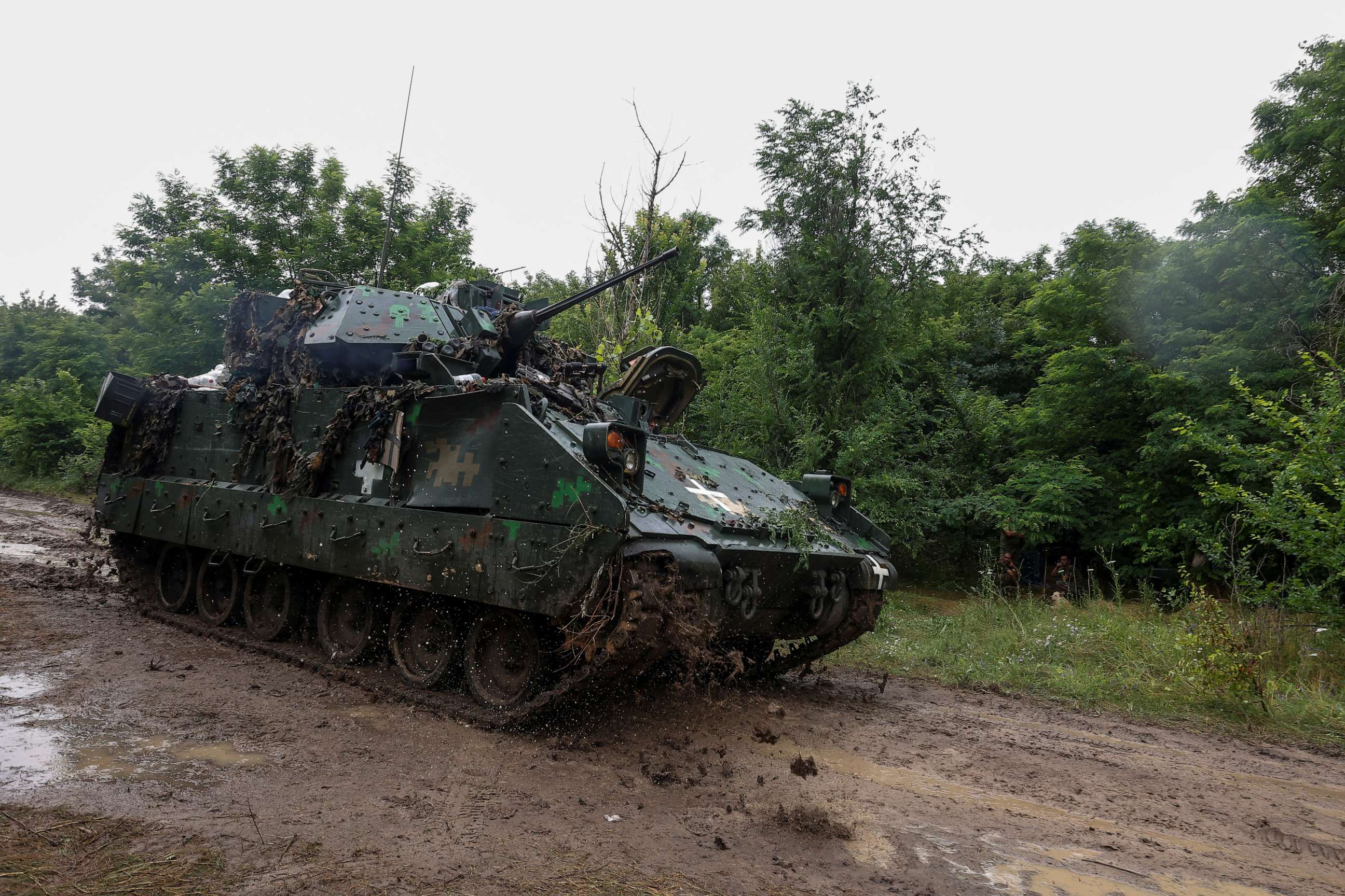 PHOTO: A Ukrainian serviceman of the 47th Magura Separate Mechanized Brigade drives a M2 Bradley infantry fighting vehicle at a position near a front line, in Zaporizhzhia region, Ukraine, on June 26, 2023.