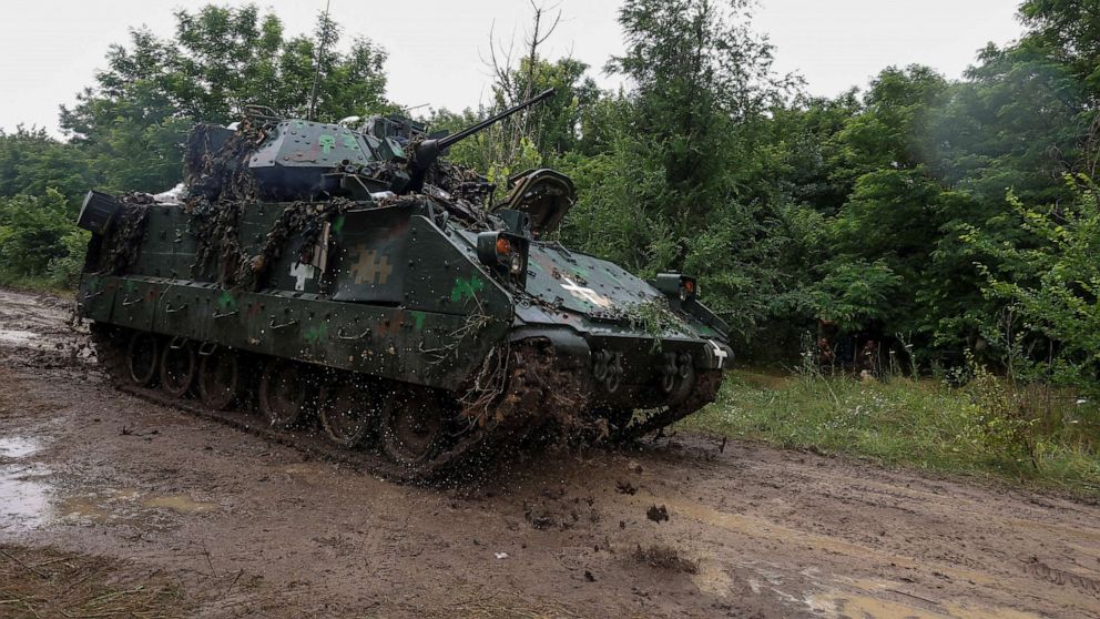PHOTO: A Ukrainian serviceman of the 47th Magura Separate Mechanized Brigade drives a M2 Bradley infantry fighting vehicle at a position near a front line, in Zaporizhzhia region, Ukraine, on June 26, 2023.