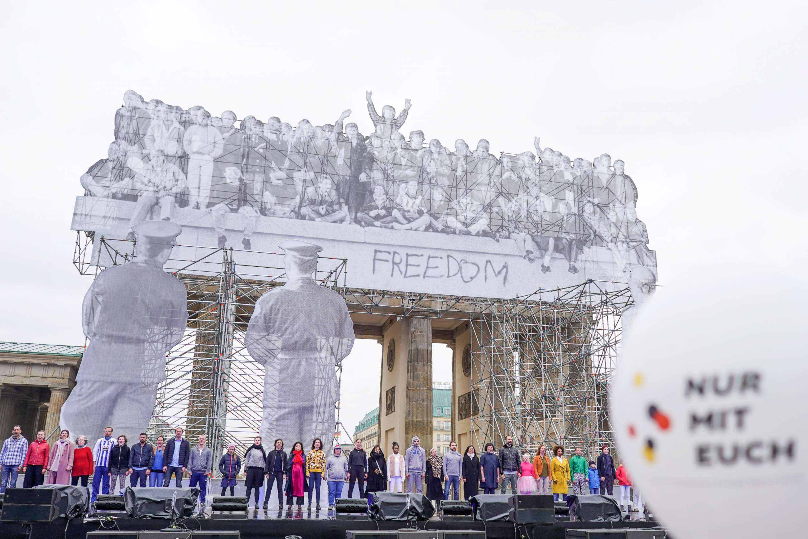 PHOTO: Numerous actors rehearse the play "Basic Law" on the main stage at the Brandenburg Gate during the celebrations of the Day of German Unity, Oct. 2, 2018, in Berlin.