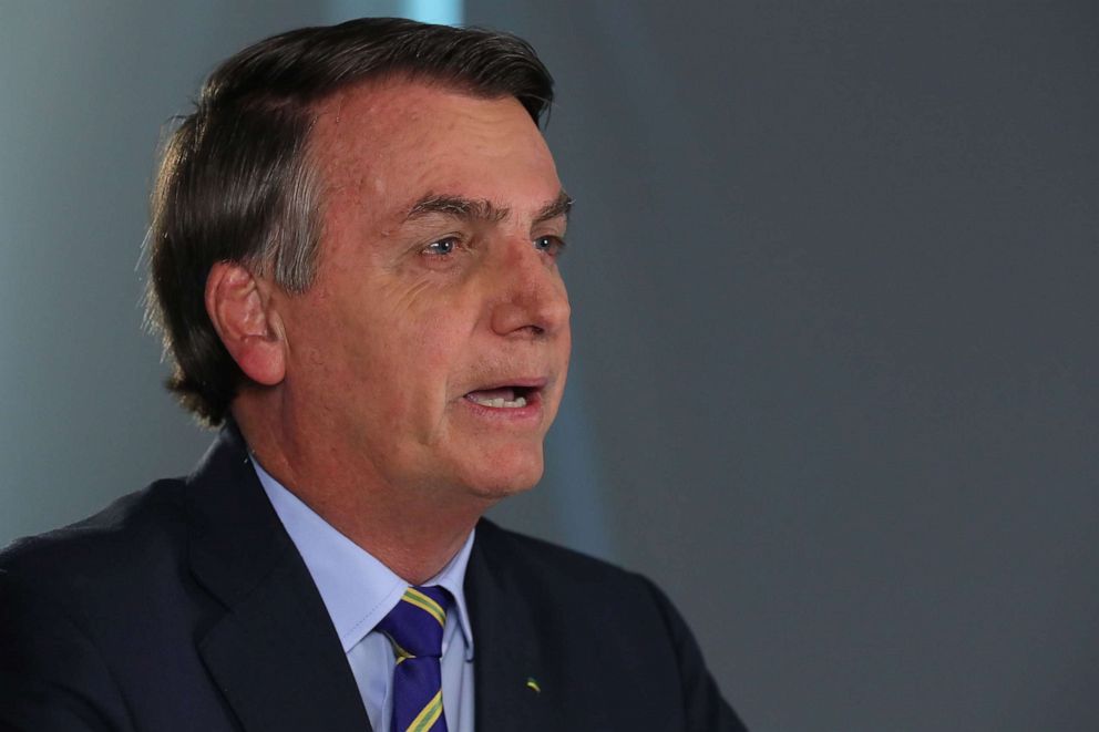 PHOTO: Handout picture released by the Brazilian Presidency press office showing Brazilian President Jair Bolsonaro speaking during a broadcast statement on the coronavirus, COVID-19, pandemic, in Brasilia, on March 31, 2020.