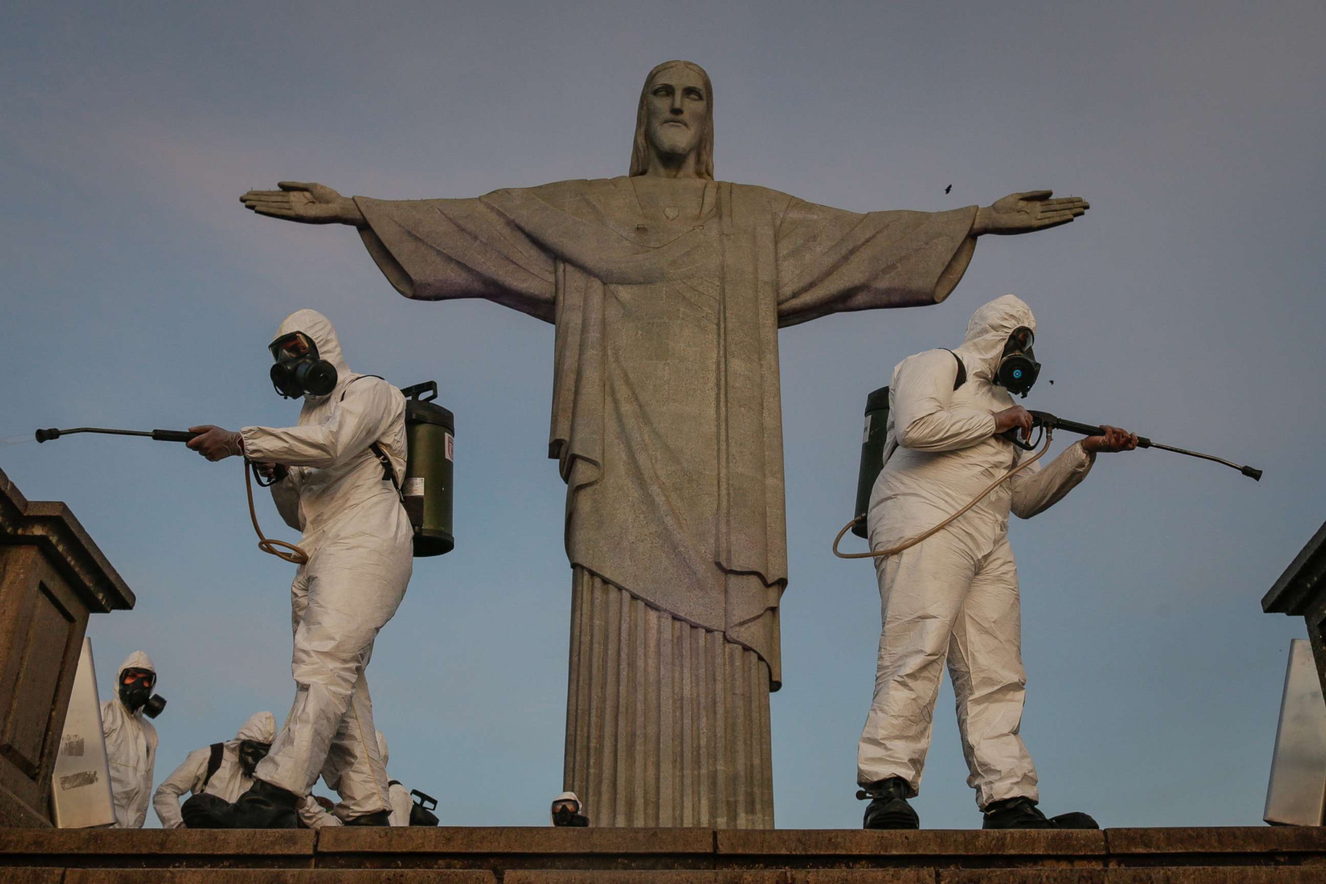 PHOTO: Military personnel belonging to the Joint Command East disinfect the Sanctuary where the statue of Christ the Redeemer is located on Aug. 13, 2020, in Rio de Janeiro.