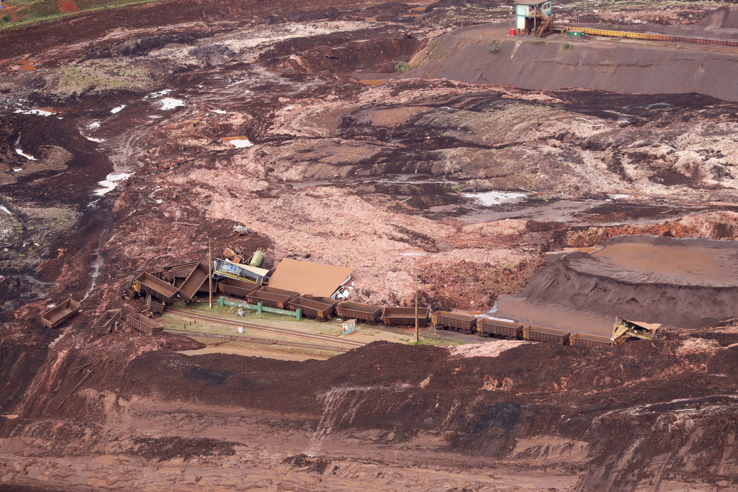 PHOTO: An aerial view shows destroyed vehicles and wagons after a dam collapsed in Brumadinho, Brazil, Saturday, Jan. 26, 2019.