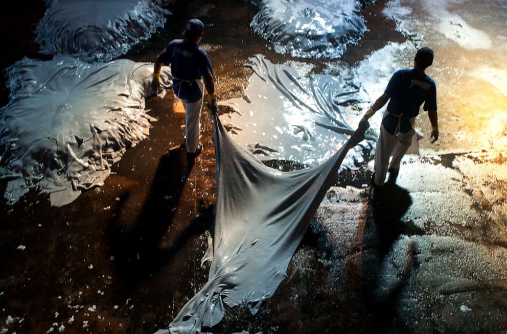 PHOTO: At a tannery in Brazil, the wet blue process of treating skins of animals is seen to produce leather.