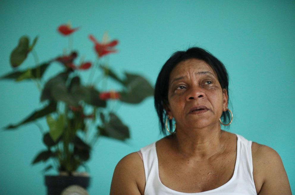 PHOTO: Maria Rosalina Rafael da Silva, mother of military police officer Alda Rafael Castilho, who was killed in the Penha complex, reacts during an interview in Rio de Janeiro, Sept. 1, 2018.
