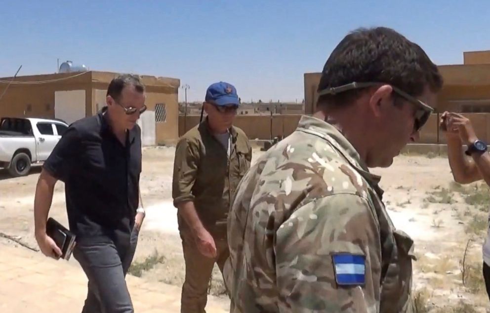 PHOTO: This frame grab from video released Wednesday June 28, 2017, by ANHA news agency, that is consistent with AP reporting, shows Brett McGurk, left, the top U.S. envoy for the international coalition combating IS, leaving after a visit to Syria.