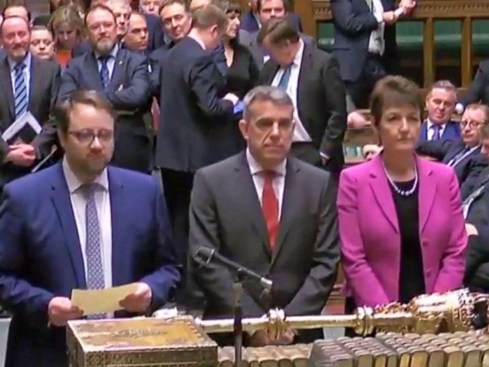 PHOTO: A grab from a handout video shows the four tellers announcing the result of the business motion to the Speaker of the House in the British House of Commons at Westminster, London, March 27, 2019.