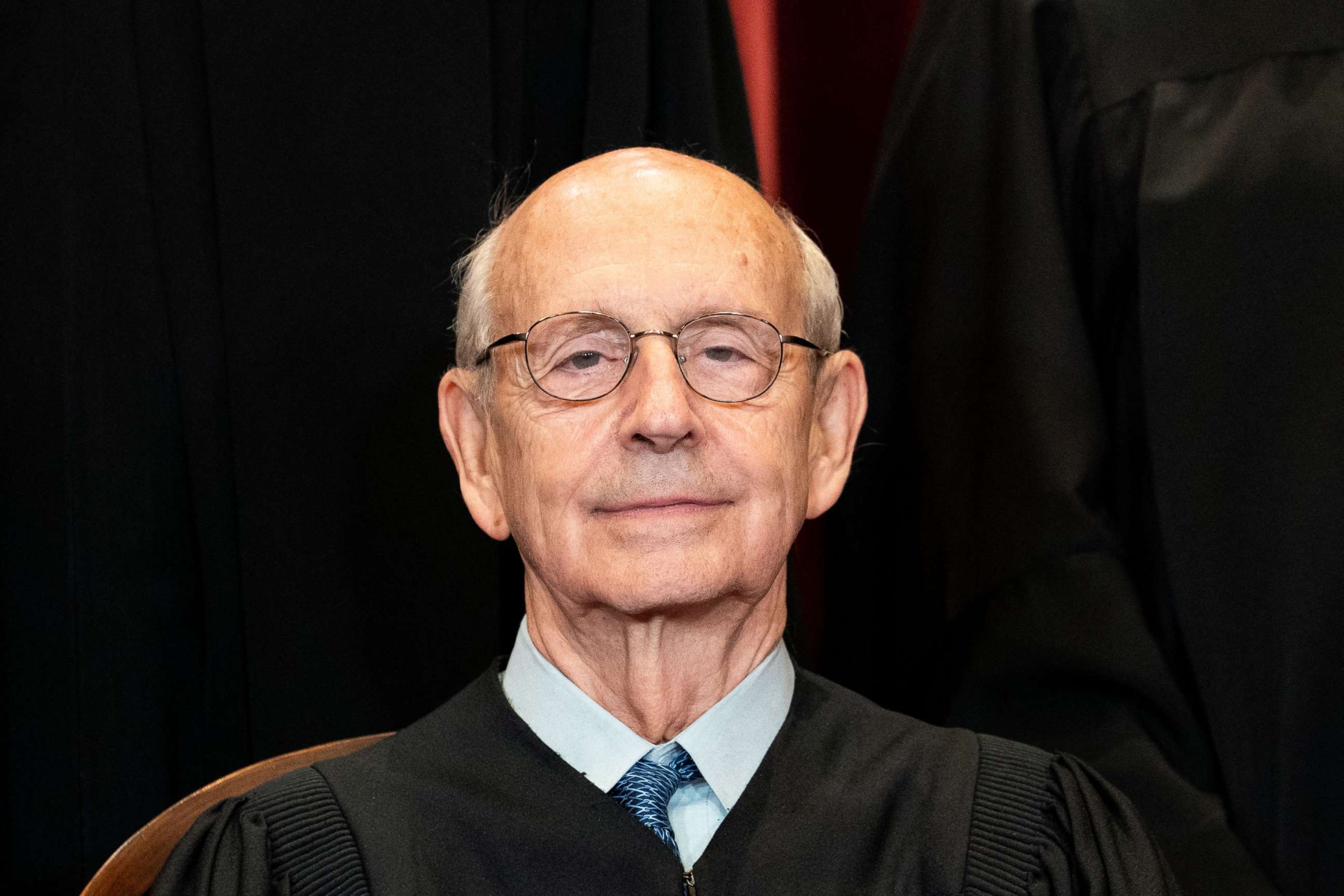 PHOTO: Associate Justice Stephen Breyer sits during a group photo of the Justices at the Supreme Court in Washington on April 23, 2021.