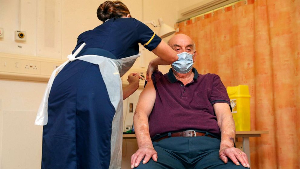 PHOTO: Brian Pinker, 82, receives the Oxford/AstraZeneca COVID-19 vaccine from chief nurse Sam Foster at Churchill Hospital in Oxford, England, on Jan. 4, 2021.