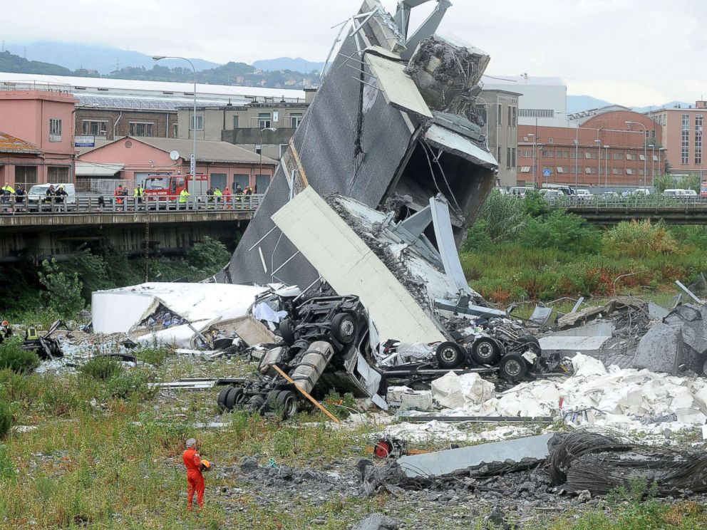 PHOTO: Rescuers work at the scene of the collapsed Morandi Bridge in the Italian port city of Genoa, Italy Aug. 14, 2018.