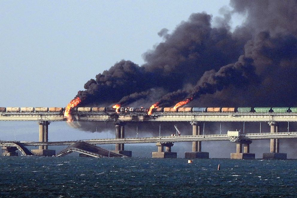 PHOTO: Black smoke billows from a fire on the Kerch Bridge that links Crimea to Russia, after a truck exploded, near Kerch, on Oct. 8, 2022.
