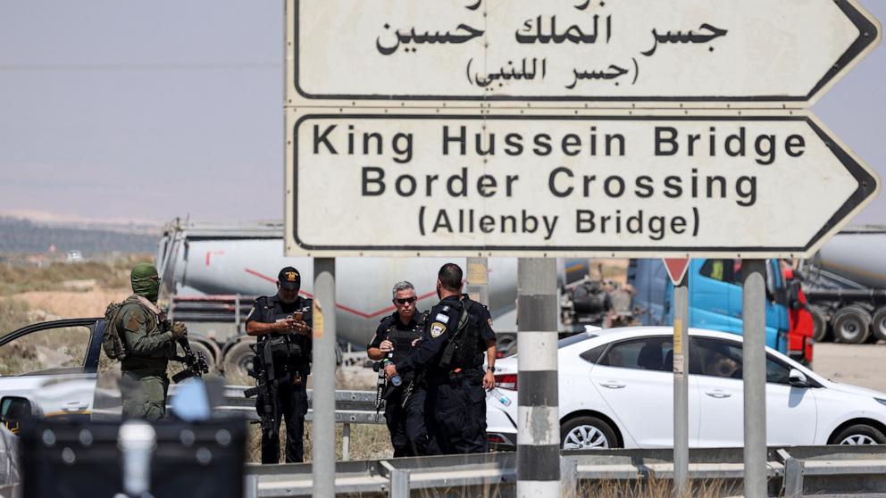 PHOTO: Israeli security forces gather at the scene of a reported attack near the Allenby Crossing between the occupied West Bank and Jordan on September 8, 2024, where the Israeli military said a truck driver opened fire, killing three Israelis. 