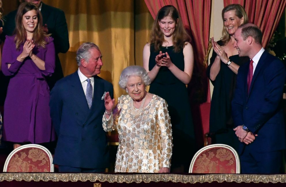 PHOTO: Britain's Queen Elizabeth II, surrounded by members of the royal family, takes her seat at the Royal Albert Hall in London, April 21, 2018, for a concert to celebrate her 92nd birthday.