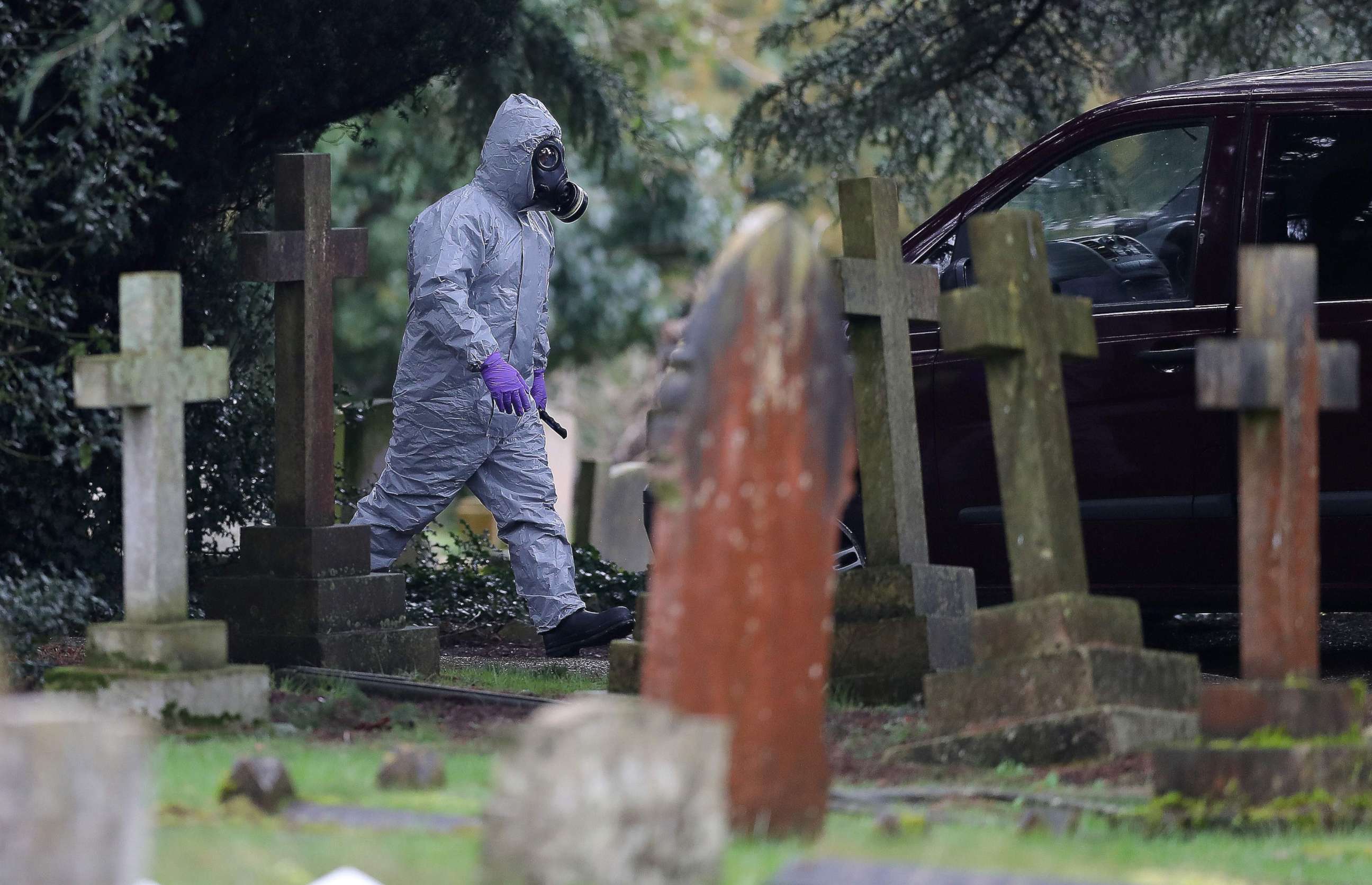 PHOTO: A member of the emergency services wearing a protective suit works at the London Road Cemetery in Salisbury, England, March 10, 2018, where the wife and son of former Russian spy Sergei Skripal are buried.