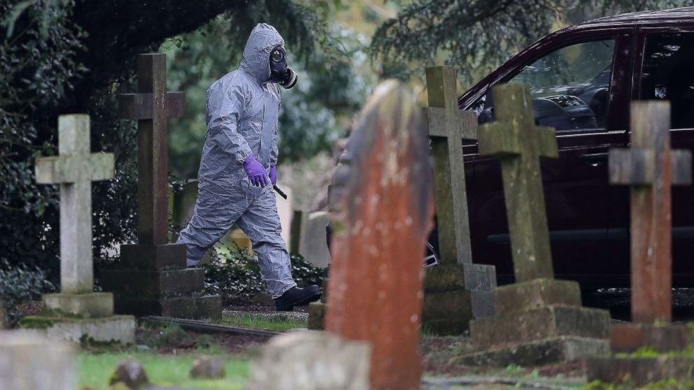 PHOTO: A member of the emergency services wearing a protective suit works at the London Road Cemetery in Salisbury, England, March 10, 2018, where the wife and son of former Russian spy Sergei Skripal are buried.