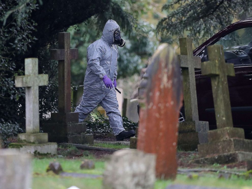 PHOTO: A member of the emergency services wearing a protective suit works at the London Road Cemetery in Salisbury, England, March 10, 2018, where the wife and son of former Russian spy Sergei Skripal are buried.