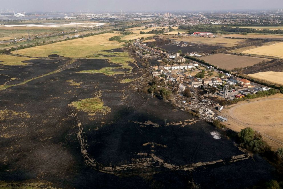 PHOTO: The scene after a wildfire blaze in the village of Wennington, east London, July 20, 2022.