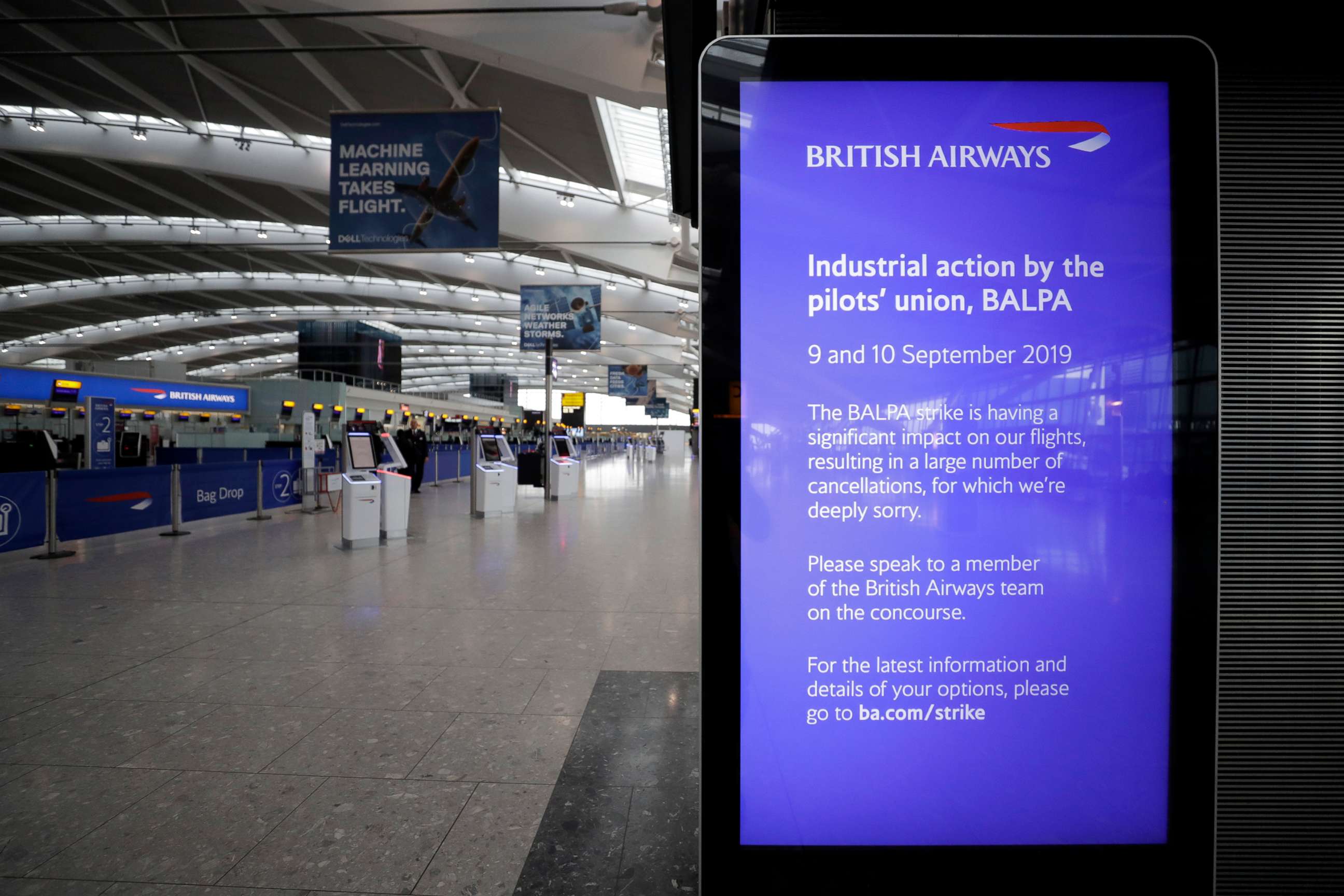 PHOTO:A screen gives information about the British Airways pilots' strike in Terminal 5 at Heathrow Airport in London, which handles British Airways flights, Sept. 9, 2019.