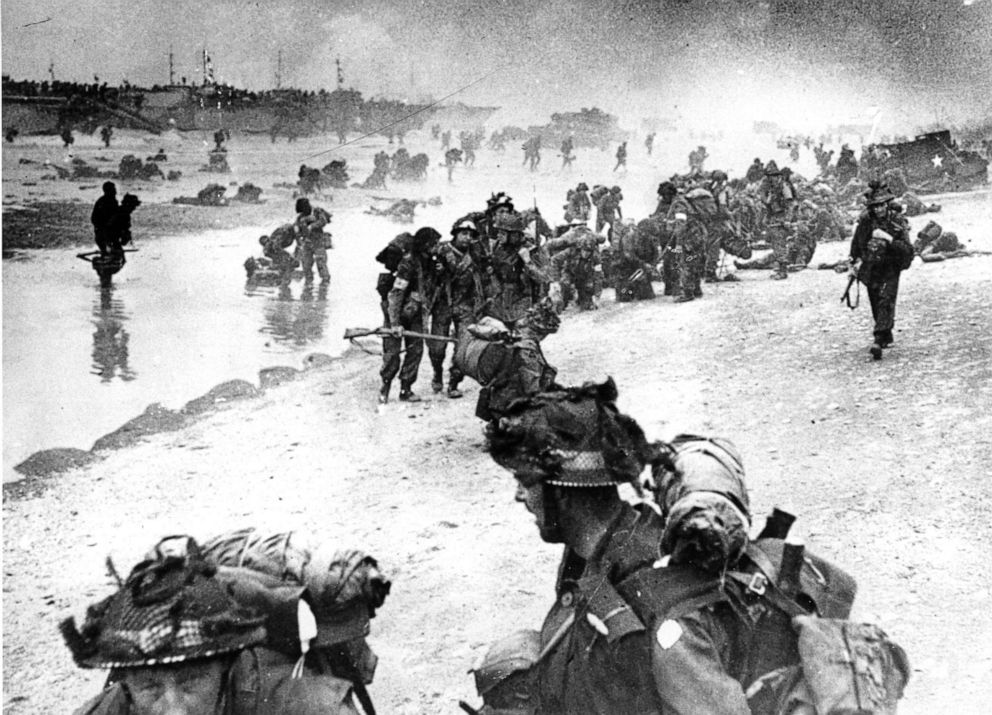 PHOTO: Wounded British troops from the South Lancashire and Middlesex regiments are being helped ashore at Sword Beach, June 6, 1944, during the D-Day invasion of German occupied France during World War II.