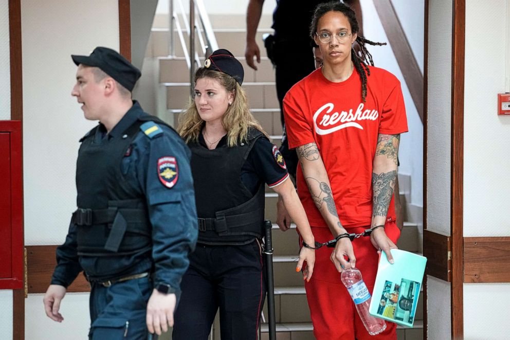 PHOTO: American professional basketball player Brittney Griner is escorted to a courtroom for a hearing in Khimki, outside Moscow, Russia, July 7, 2022.