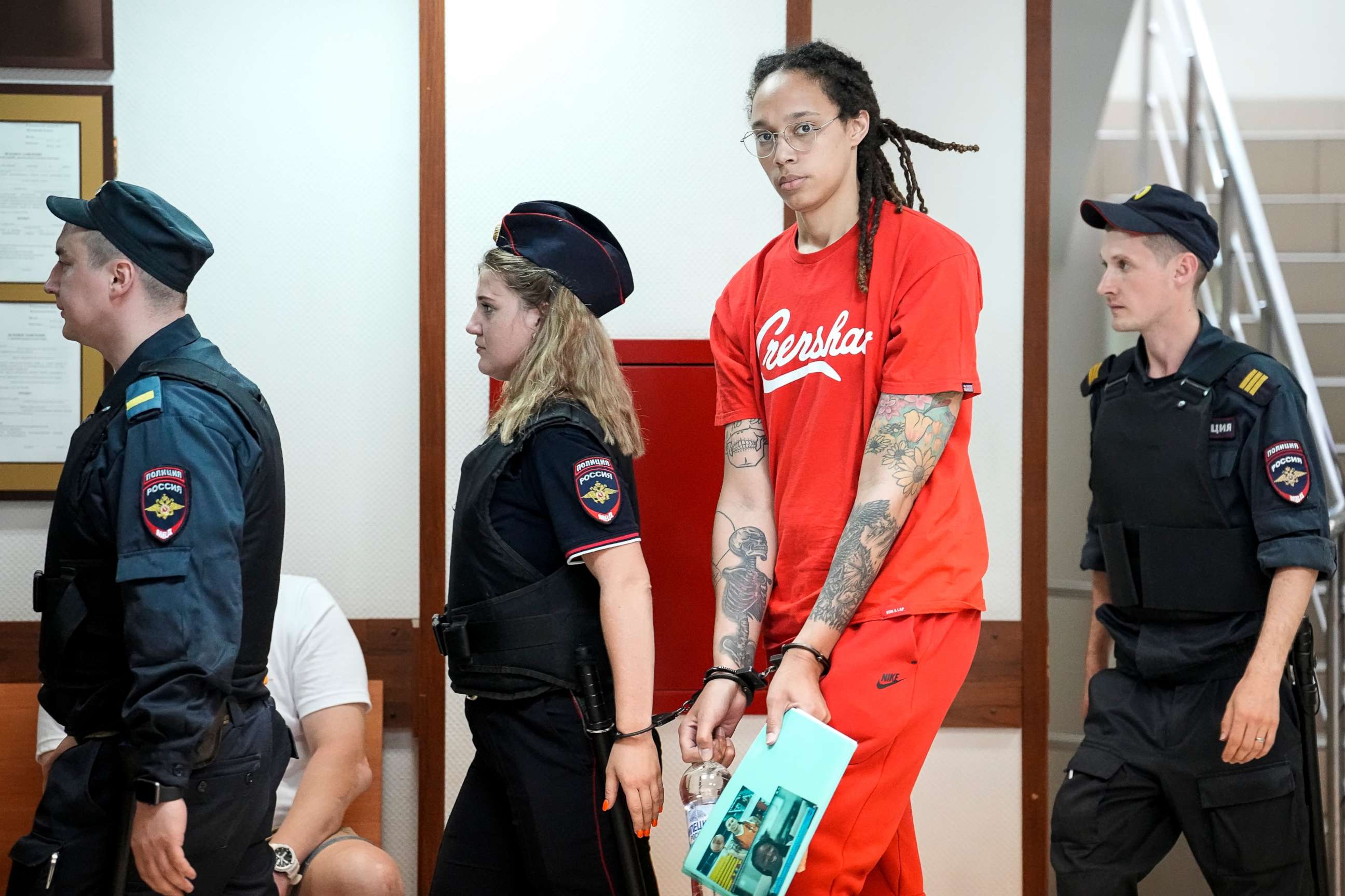 PHOTO: American professional basketball player Brittney Griner is escorted to a courtroom for a hearing in Khimki, outside Moscow, Russia, July 7, 2022. 