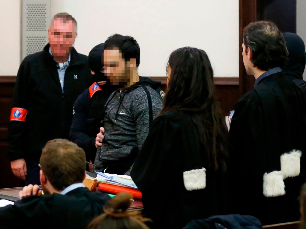 PHOTO: The alleged accomplice of the November 2015 Paris attacks suspect Salah Abdeslam, Sofiane Ayari, center, is escorted by Belgian police officers as he arrives in a courtroom in Brussels on Feb. 8, 2018.