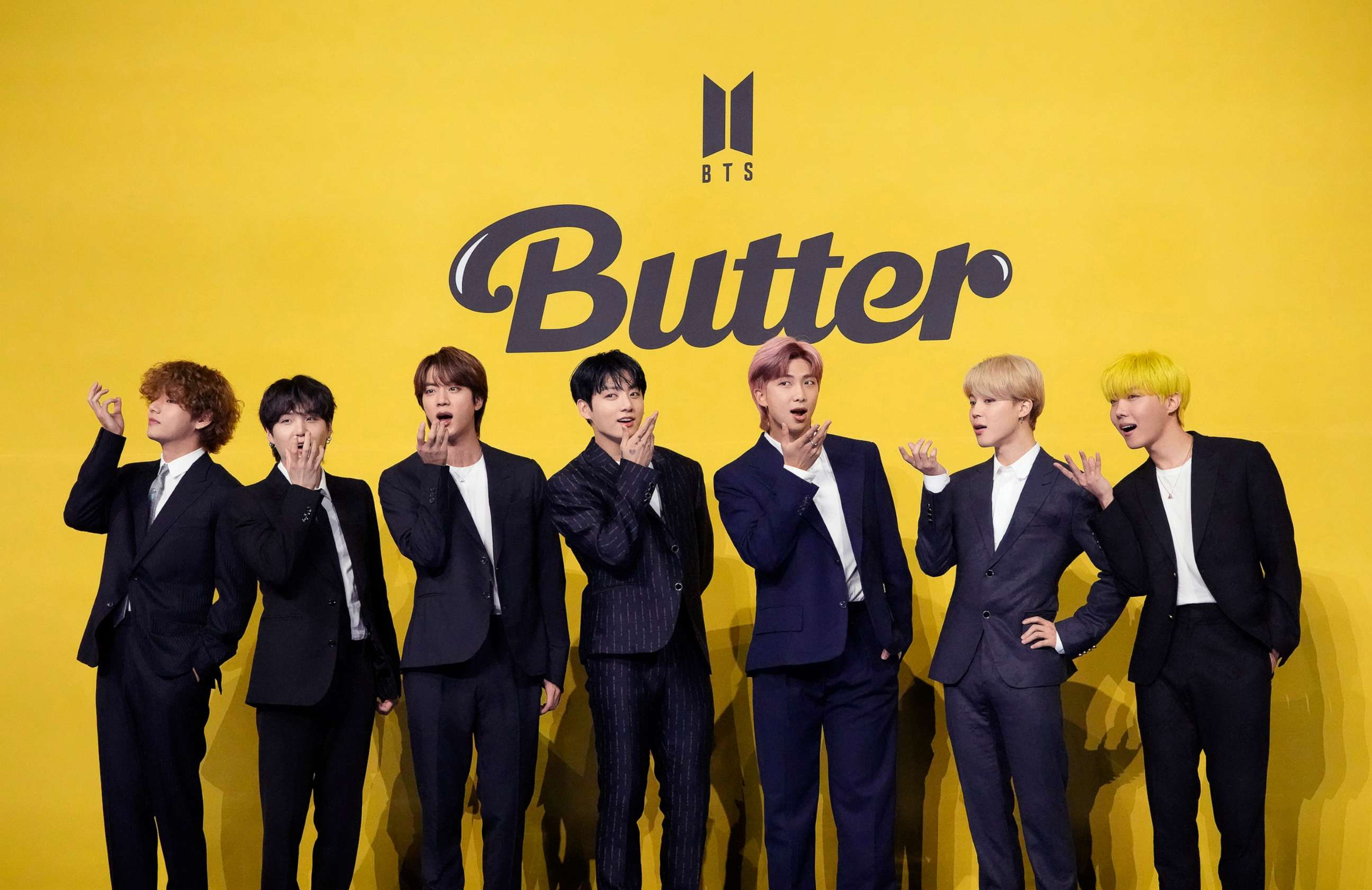 PHOTO: Members of South Korean K-pop band BTS pose for photographers to introduce their new single "Butter" in Seoul, South Korea, May 21, 2021.